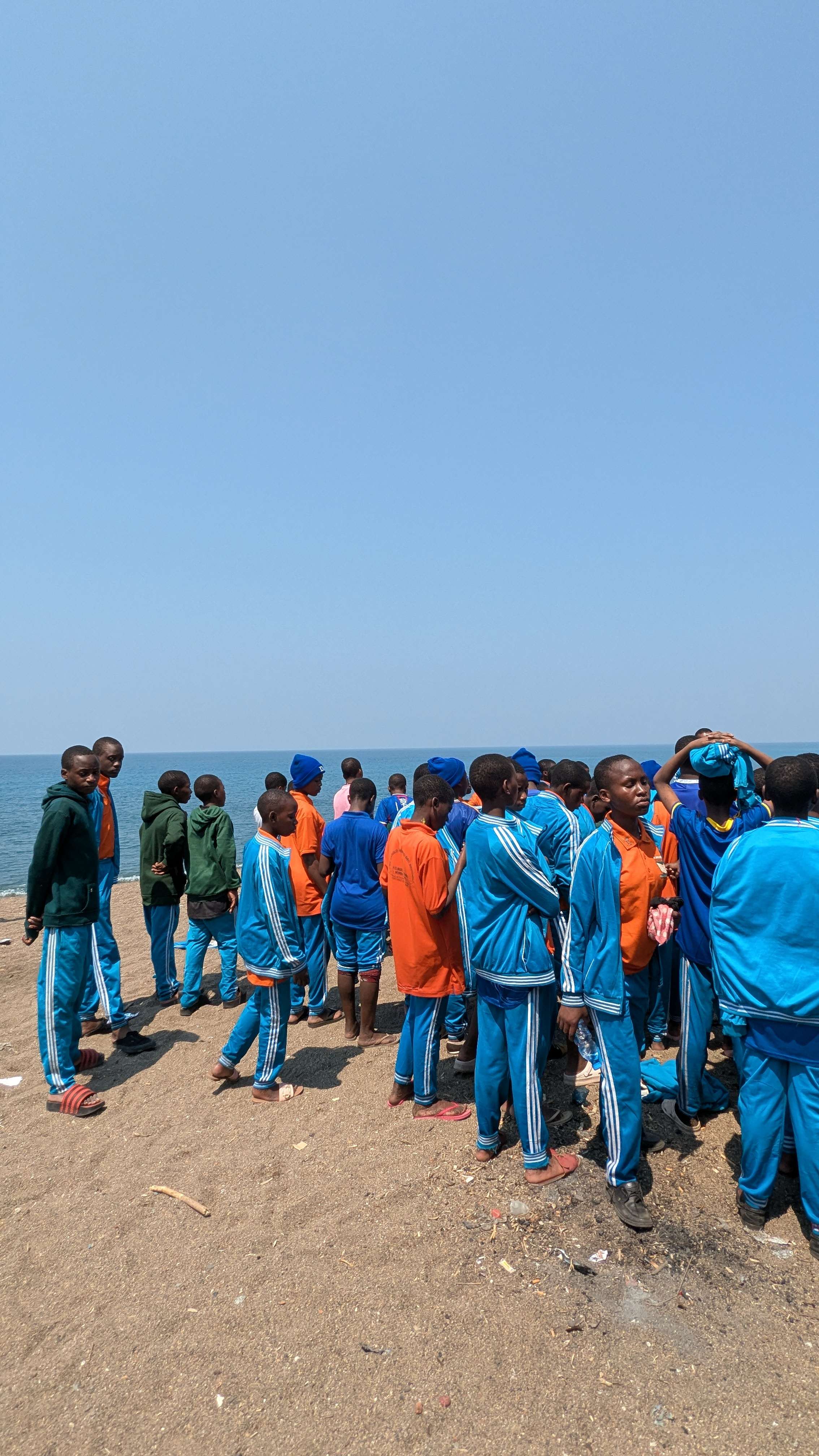 Students interacting at Matema Beach